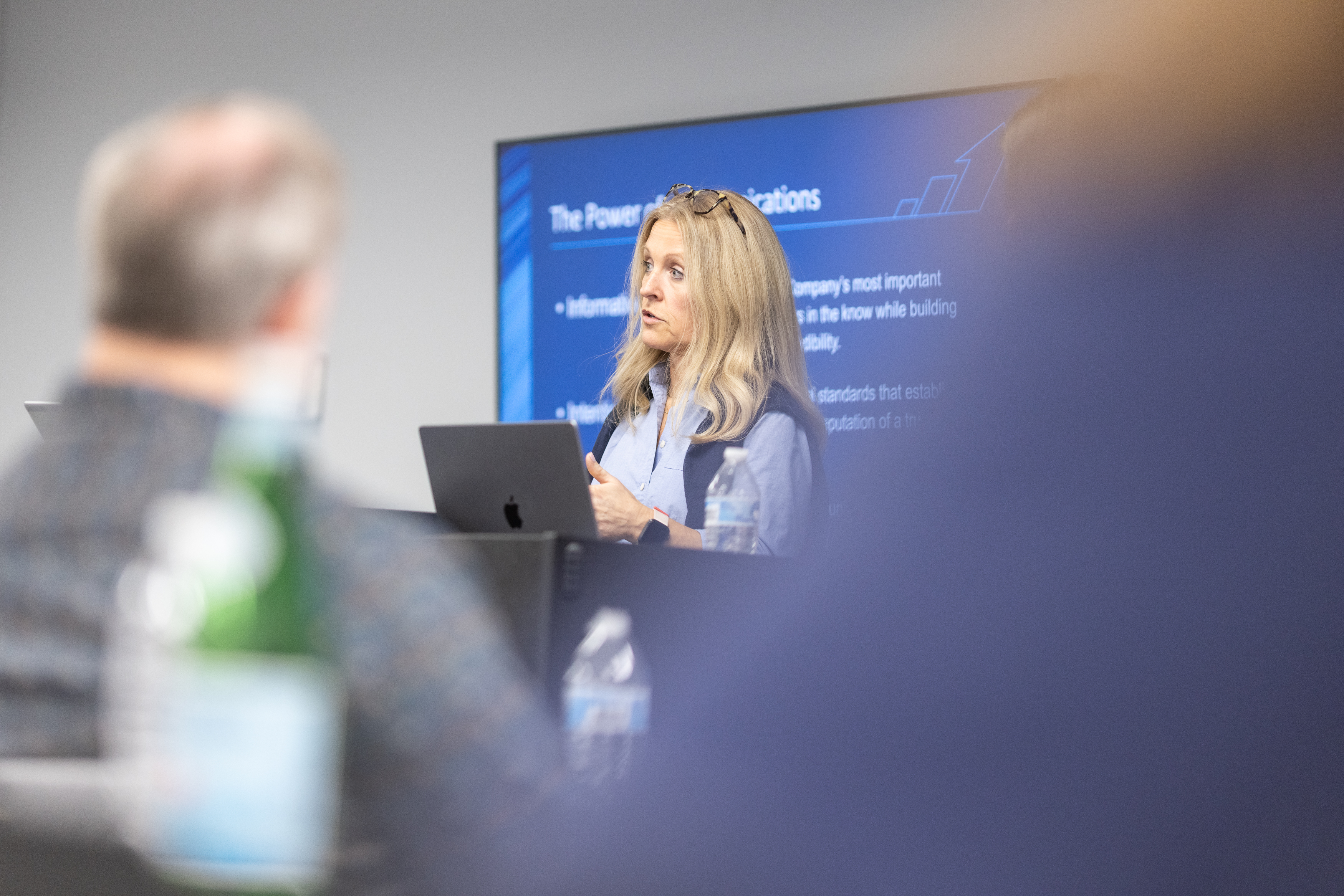 Mindy Smyth presenting at a business leadership event